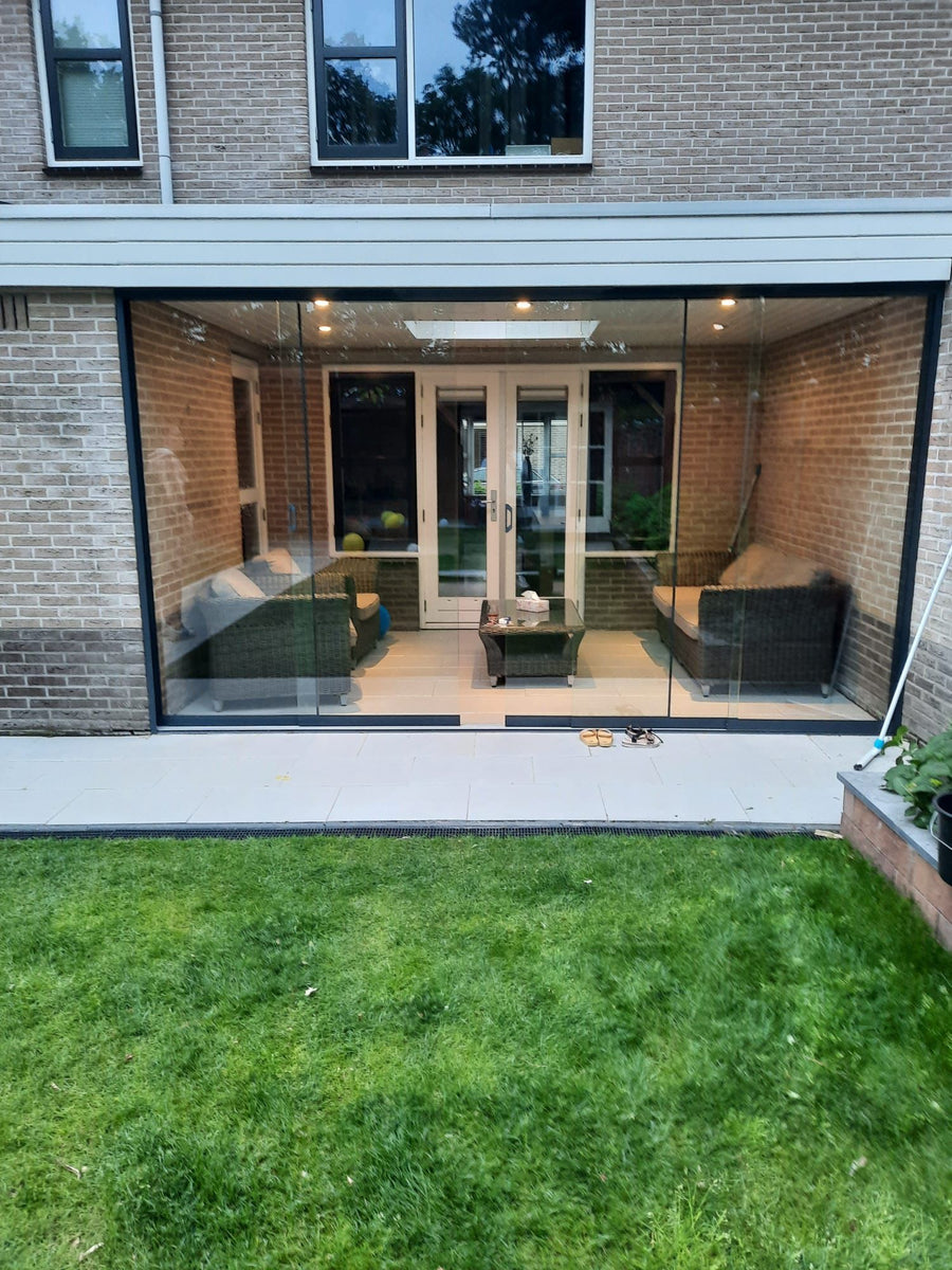 Glazen schuifwand bij stadswoning in Utrecht